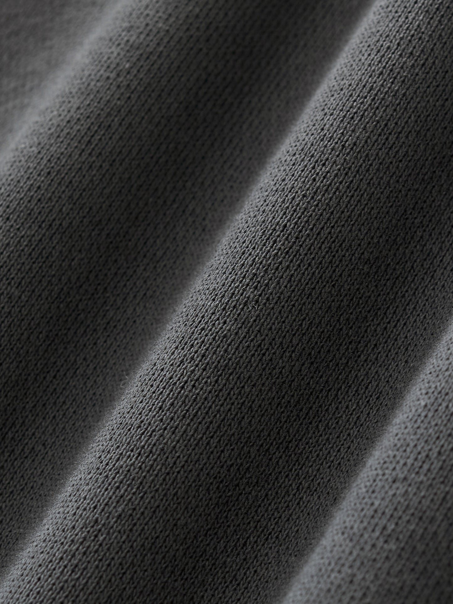 ODMPOD Essential Heavyweight Fleece Hoodie, front view showing soft fleece fabric and relaxed fit in a casual hoodie style