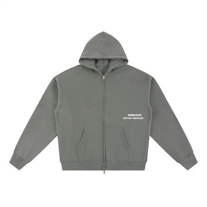 ODMPOD Essential fleece zip-through hoodie showing front view with hood and zipper, soft knit fabric and casual fit.