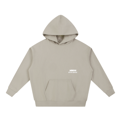 ODMPOD Essential Heavyweight Hoodie in black, showing front view with hood and drawstrings, made from thick, cozy fabric.