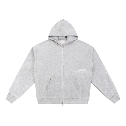 ODMPOD Essential fleece zip-through hoodie with front pockets and adjustable drawstrings, shown in a cozy, soft fabric.