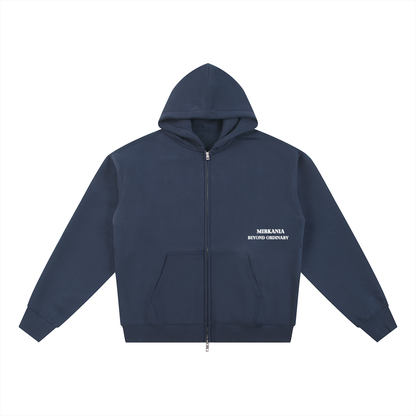 ODMPOD Essential fleece zip-through hoodie with front pockets, soft fabric, and adjustable drawstring hood on a plain background.