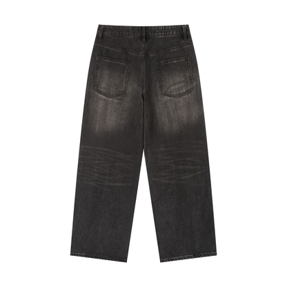 Vintage wash heavyweight denim jeans by ODMPOD, featuring classic five-pocket design and sturdy denim fabric.