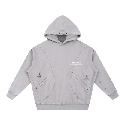 ODMPOD snow washed distressed panel hoodie with front pocket and casual fit, featuring a rugged, stylish design.