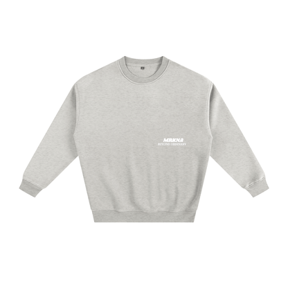 ODMPOD fleeced sweatshirt with cozy, soft fabric and ribbed cuffs, displayed on a hanger. Perfect for casual wear.