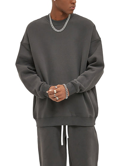 ODMPOD fleeced sweatshirt with cozy, soft fabric in a relaxed fit, shown in a front view with long sleeves and a crew neckline.