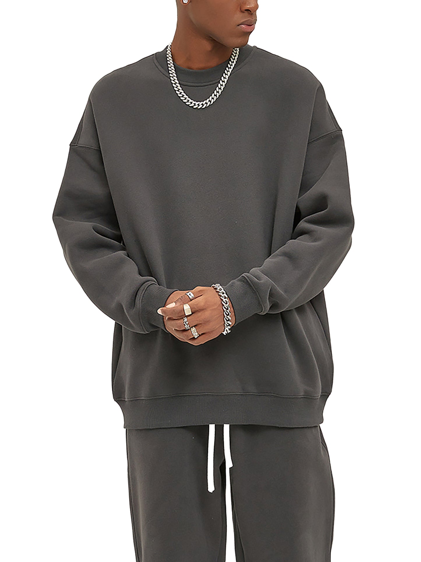 ODMPOD fleeced sweatshirt, cozy and soft, showing the front view with a relaxed fit and ribbed cuffs in a neutral color.