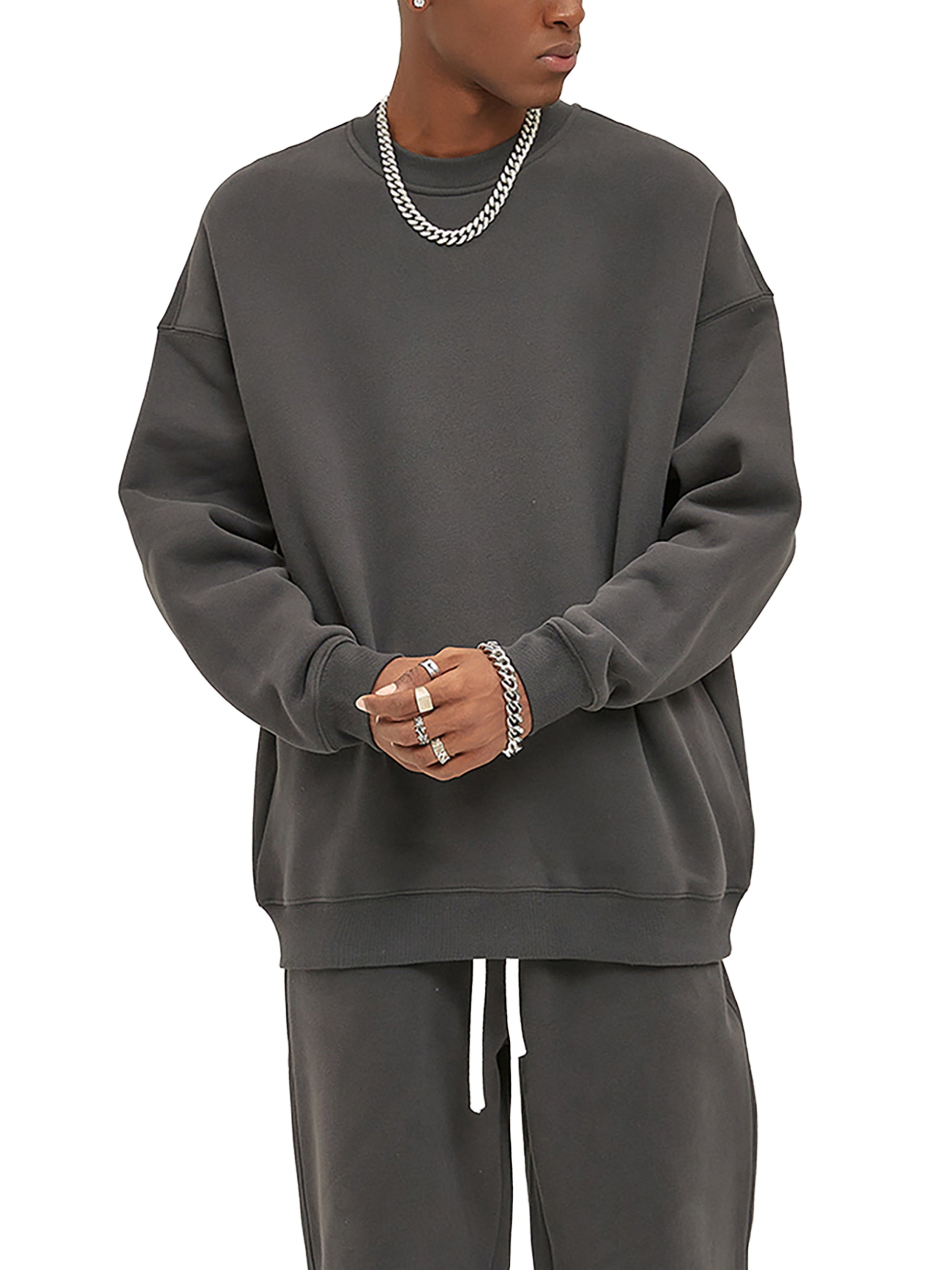 ODMPOD fleeced sweatshirt, cozy and soft with a relaxed fit, shown in a neutral color on a hanger.
