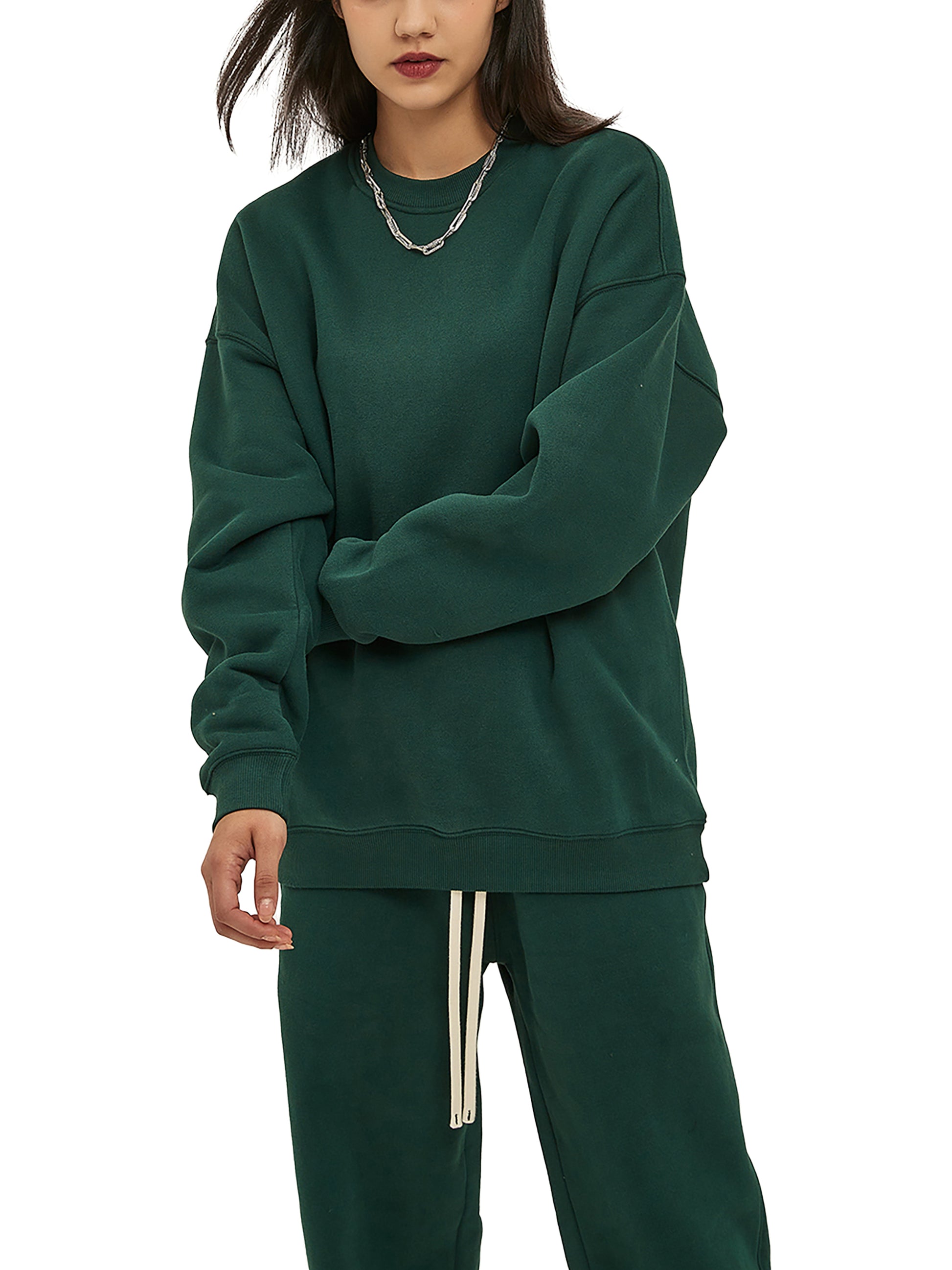 ODMPOD fleeced sweatshirt shown in soft, cozy fabric with a relaxed fit and ribbed cuffs, displayed on a hanger.