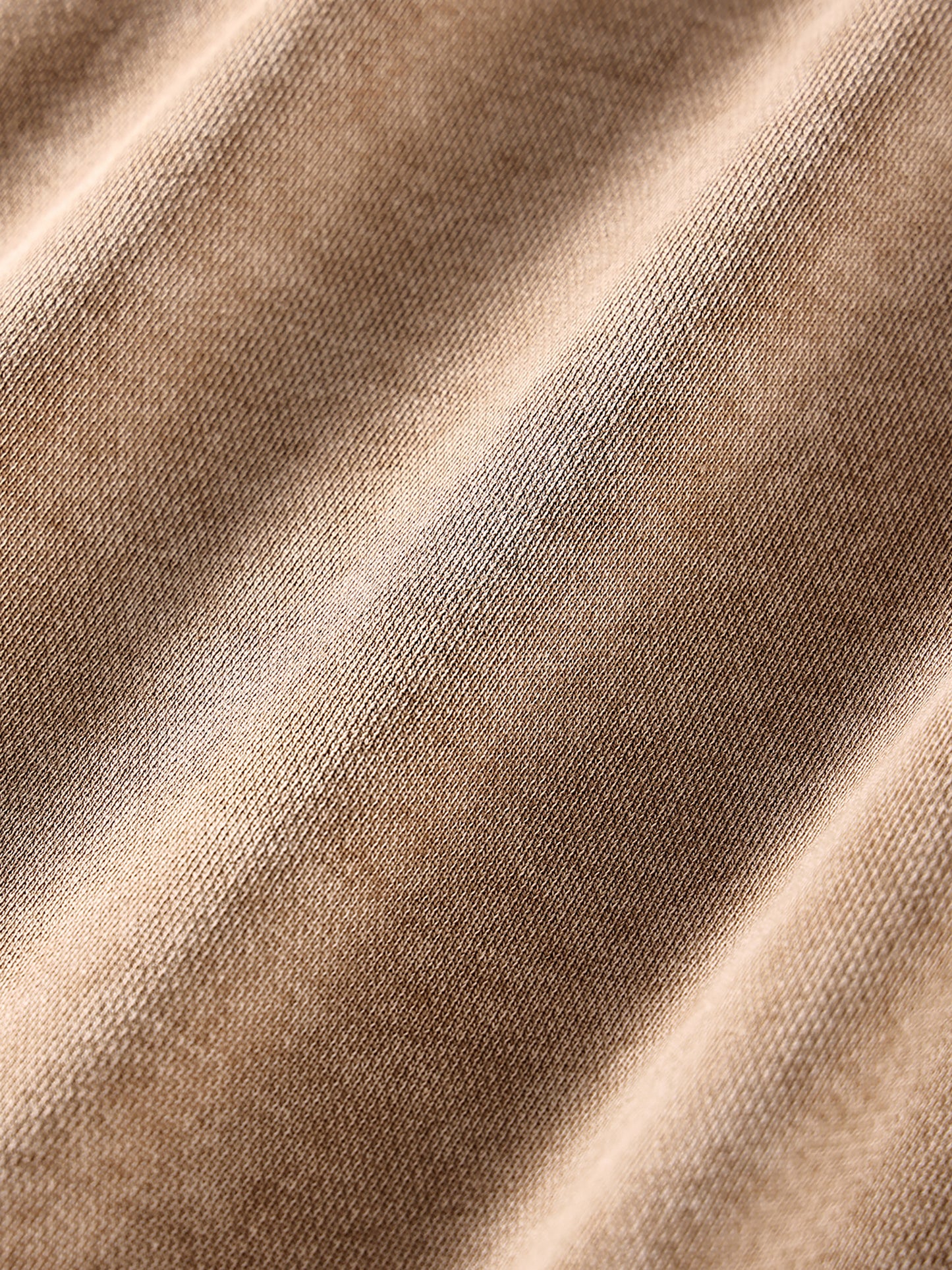ODMPOD snow washed loose cotton hoodie displayed flat, showing its relaxed fit, soft fabric, and subtle color details.