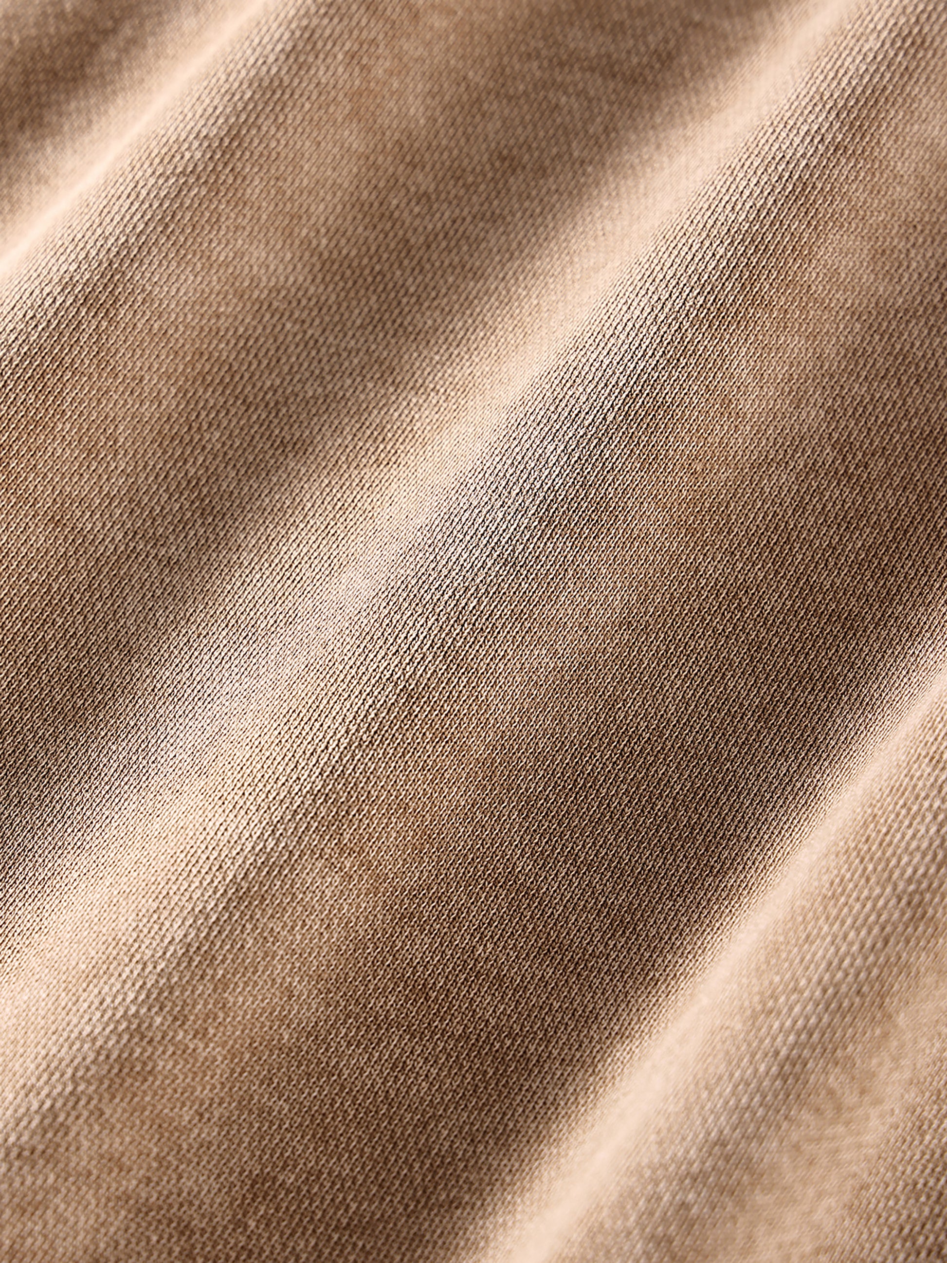 ODMPOD snow washed loose cotton hoodie displayed flat, showing its relaxed fit, soft fabric, and subtle color details.