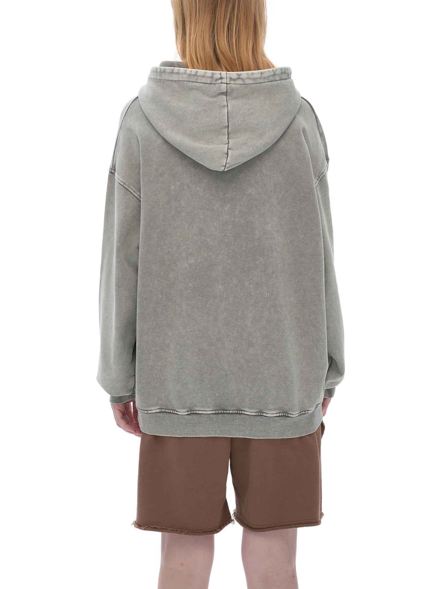 ODMPOD Snow Washed Loose Cotton Hoodie displayed on a hanger, showing its relaxed fit and soft fabric texture.