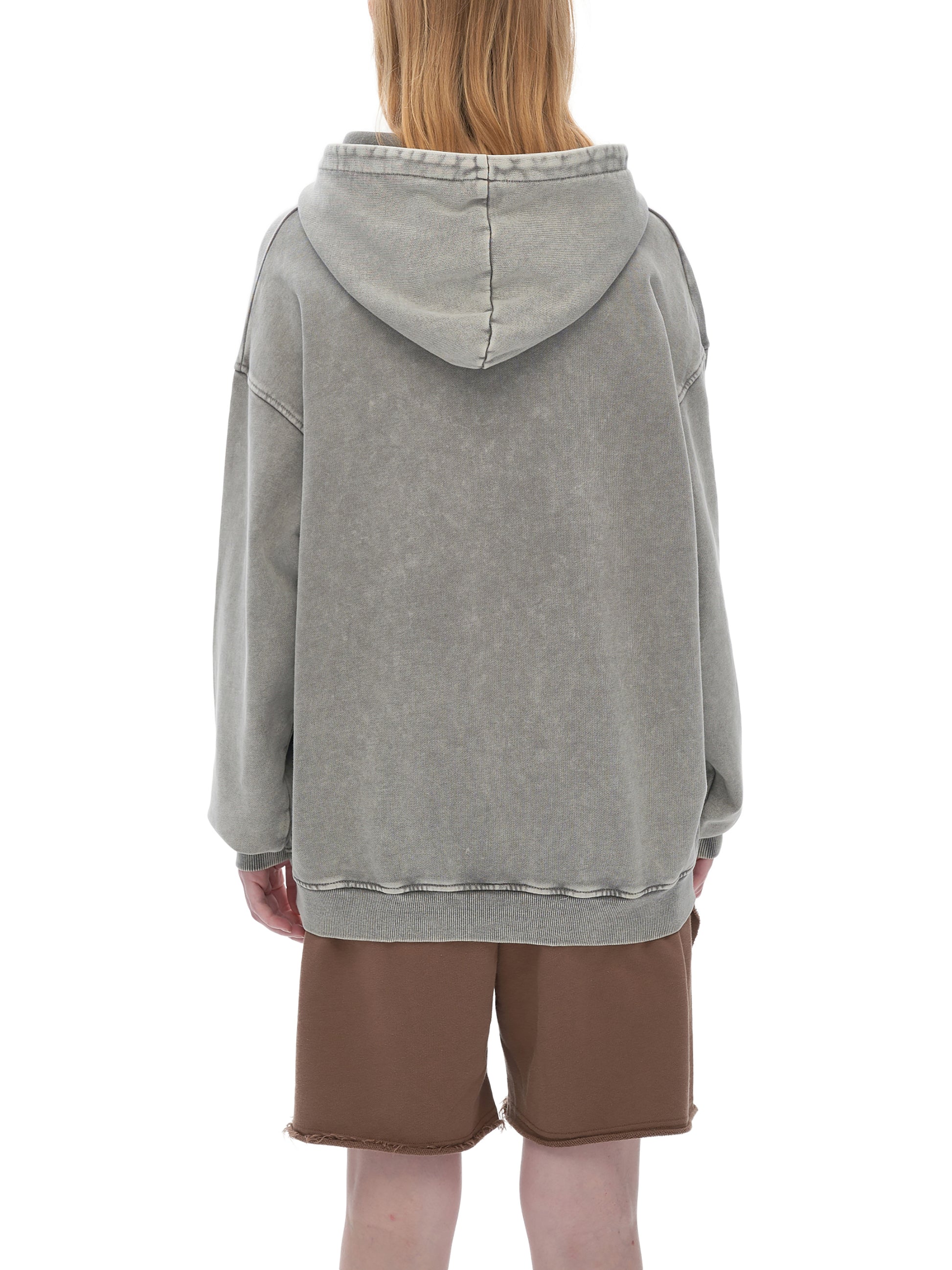 ODMPOD Snow Washed Loose Cotton Hoodie displayed on a hanger, showing its relaxed fit and soft fabric texture.