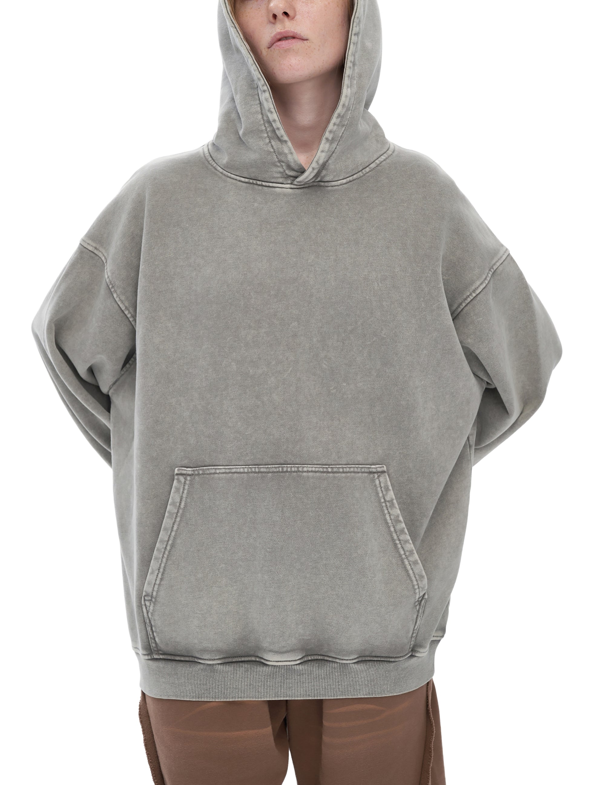 ODMPOD snow washed loose cotton hoodie with a relaxed fit, featuring a hood and front pocket, in soft, washed cotton fabric.
