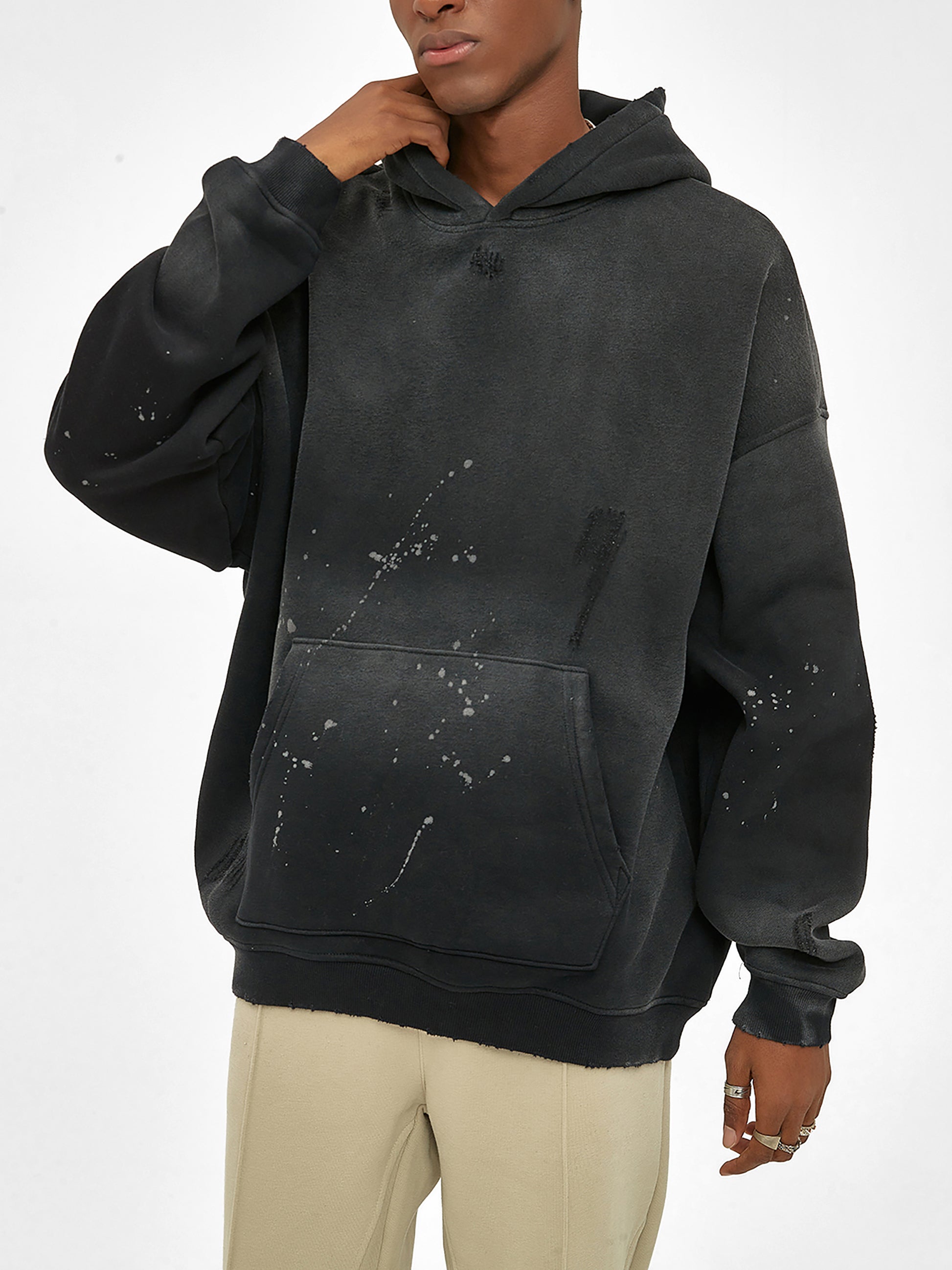 Vintage washed frayed fleece hoodie from ODMPOD, showing the soft, distressed fabric and relaxed fit of the casual hoodie.