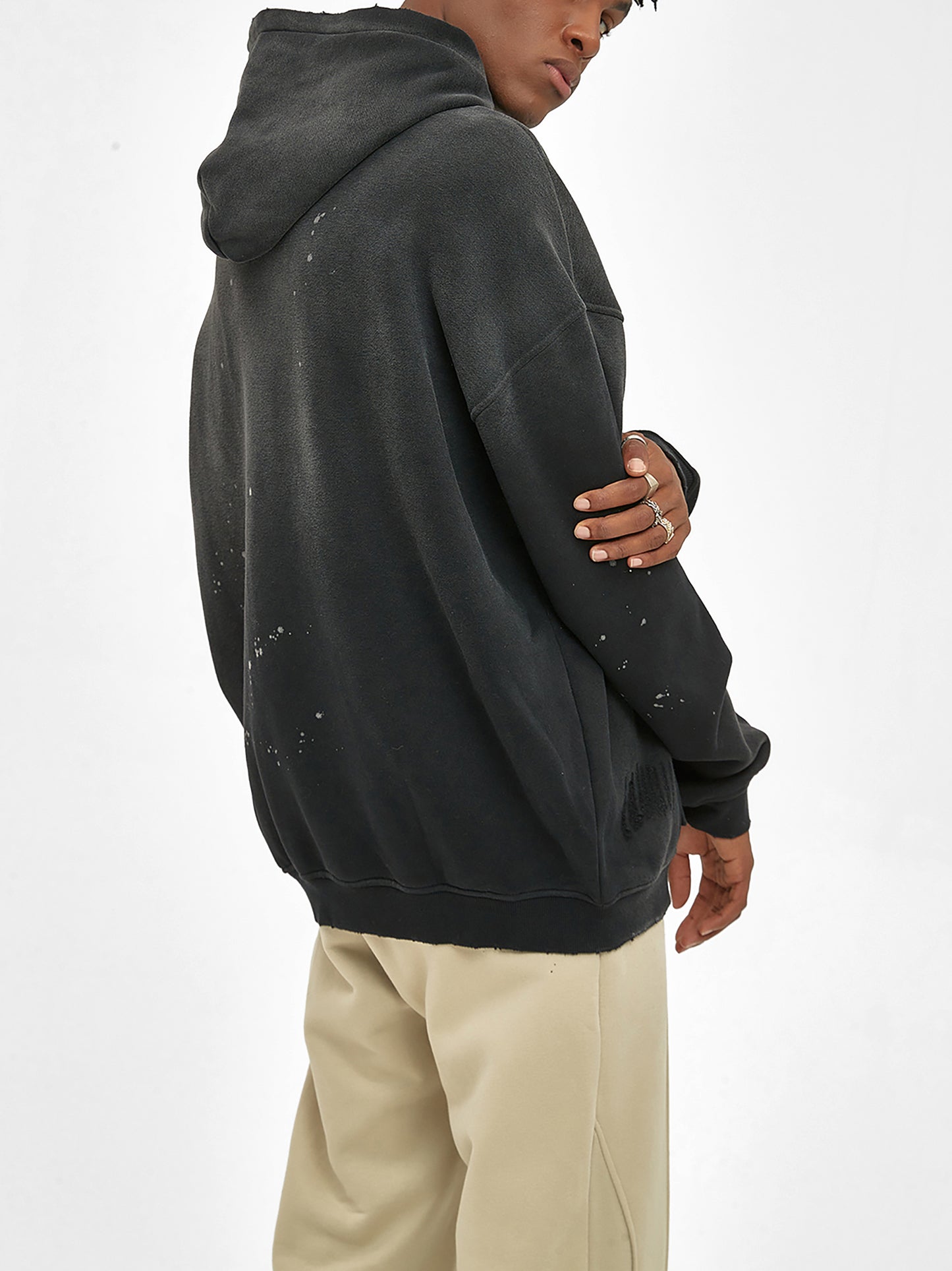 Vintage washed frayed fleece hoodie by ODMPOD featuring a cozy, distressed fabric with frayed edges and a relaxed fit.