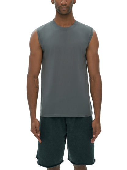 Men's sleeveless cotton tank top by ODMPOD, shown in a neutral color, with a close-up view of the fabric and fit.