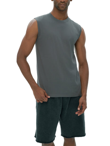 Men's sleeveless cotton tank top from ODMPOD, shown in a neutral color, with a close-up of the fabric and fit.