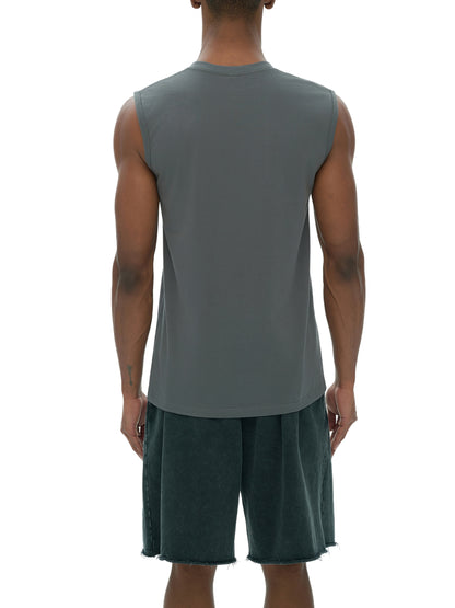 Men's sleeveless cotton tank top from ODMPOD, shown in a casual fit with a round neckline and sleeveless design.