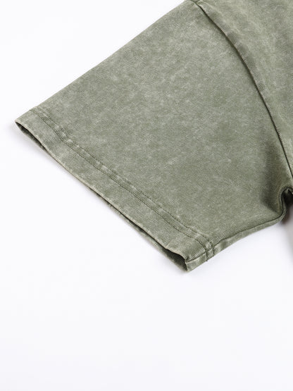 ODMPOD snow washed heavyweight oversized t-shirt in light color, featuring a relaxed fit and soft, textured fabric.