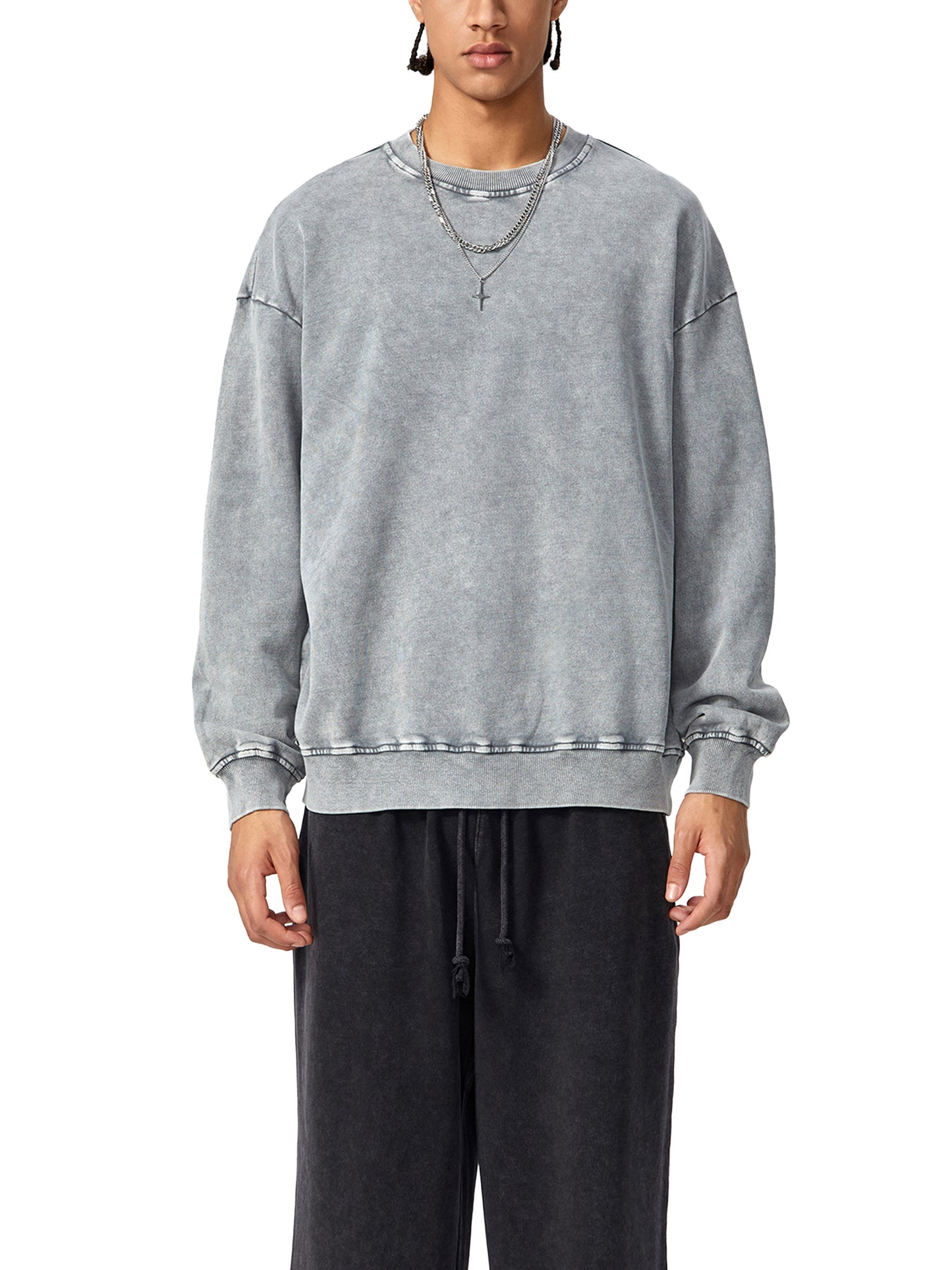 ODMPOD Snow Washed Oversized Sweatshirt, beige with a relaxed fit, soft fabric, displayed on a hanger.