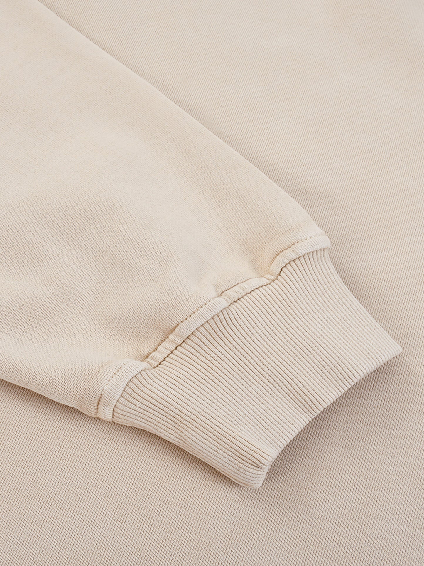 ODMPOD Snow Washed Oversized Sweatshirt in light gray, showing relaxed fit and soft fabric, casual streetwear style.