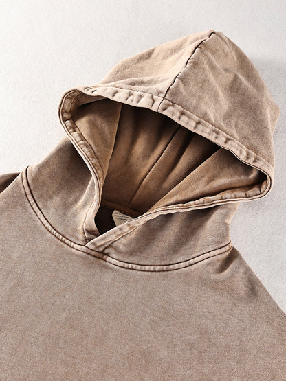 ODMPOD Snow Washed Loose Cotton Hoodie showing soft, relaxed fit with hood and long sleeves in a casual style.