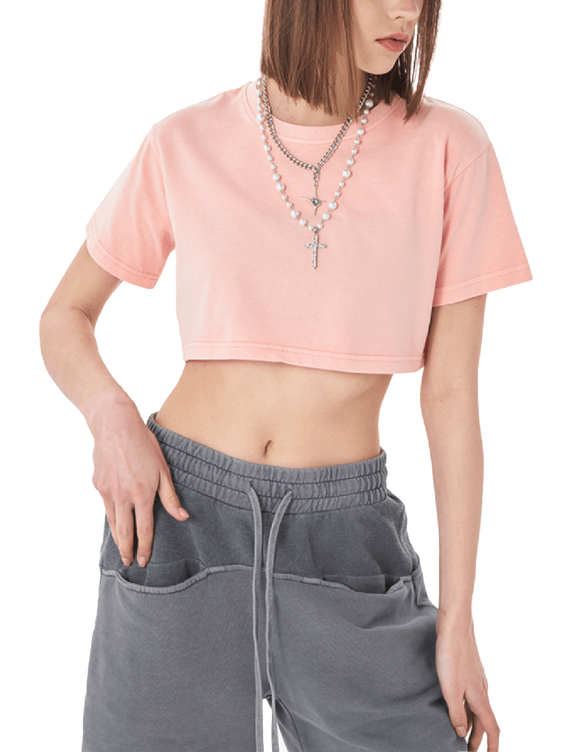 ODMPOD snow washed crop top t-shirt, light blue with short sleeves and relaxed fit, displayed on a hanger.