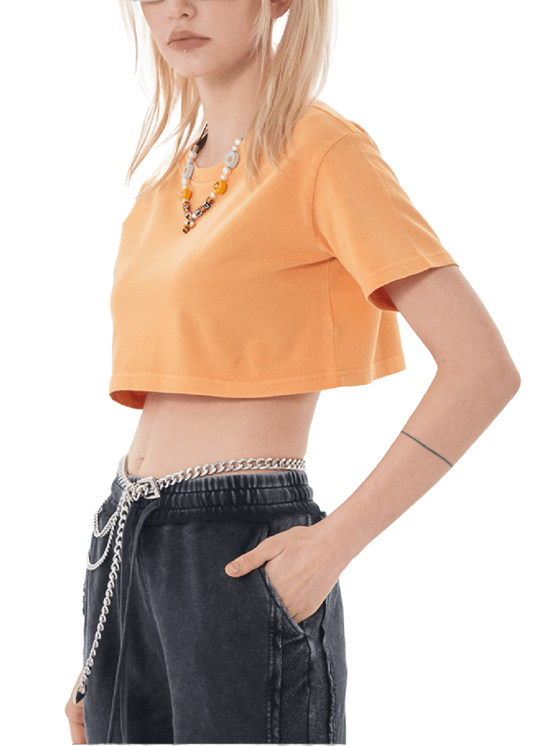 ODMPOD snow washed crop top t-shirt with a relaxed fit, soft fabric, and casual style, shown in a light washed color.