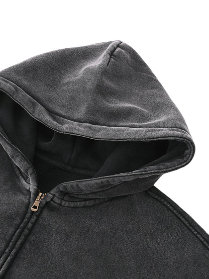 ODMPOD zip-through boxy fleece hoodie showing a front view with a relaxed fit and cozy fleece material.