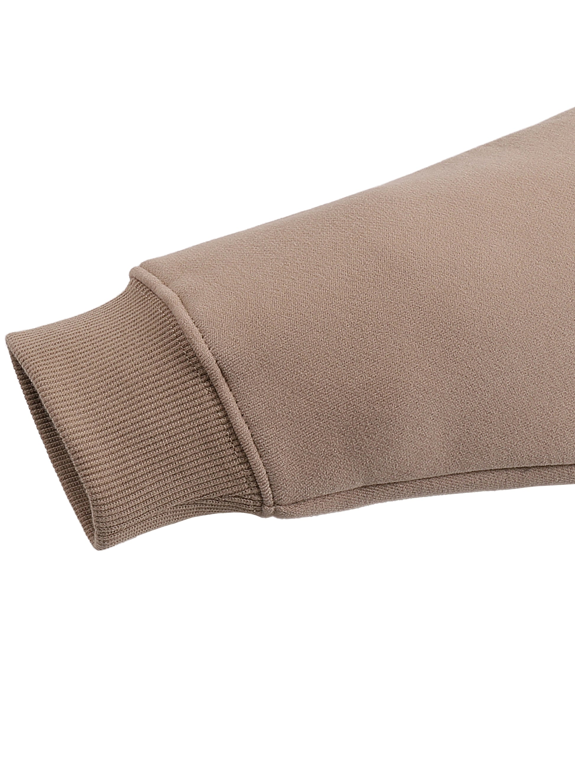 ODMPOD fleeced sweatshirt showing a cozy, soft fabric with a relaxed fit and ribbed cuffs, in a neutral color.