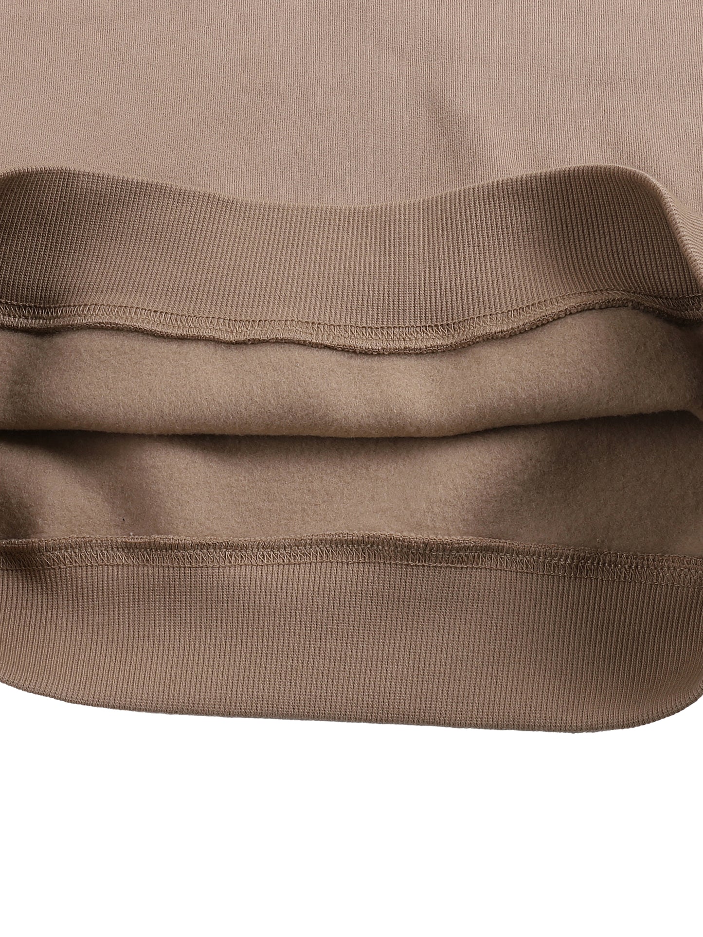 ODMPOD fleeced sweatshirt showing a cozy, soft fabric with a relaxed fit and ribbed cuffs, displayed on a hanger.