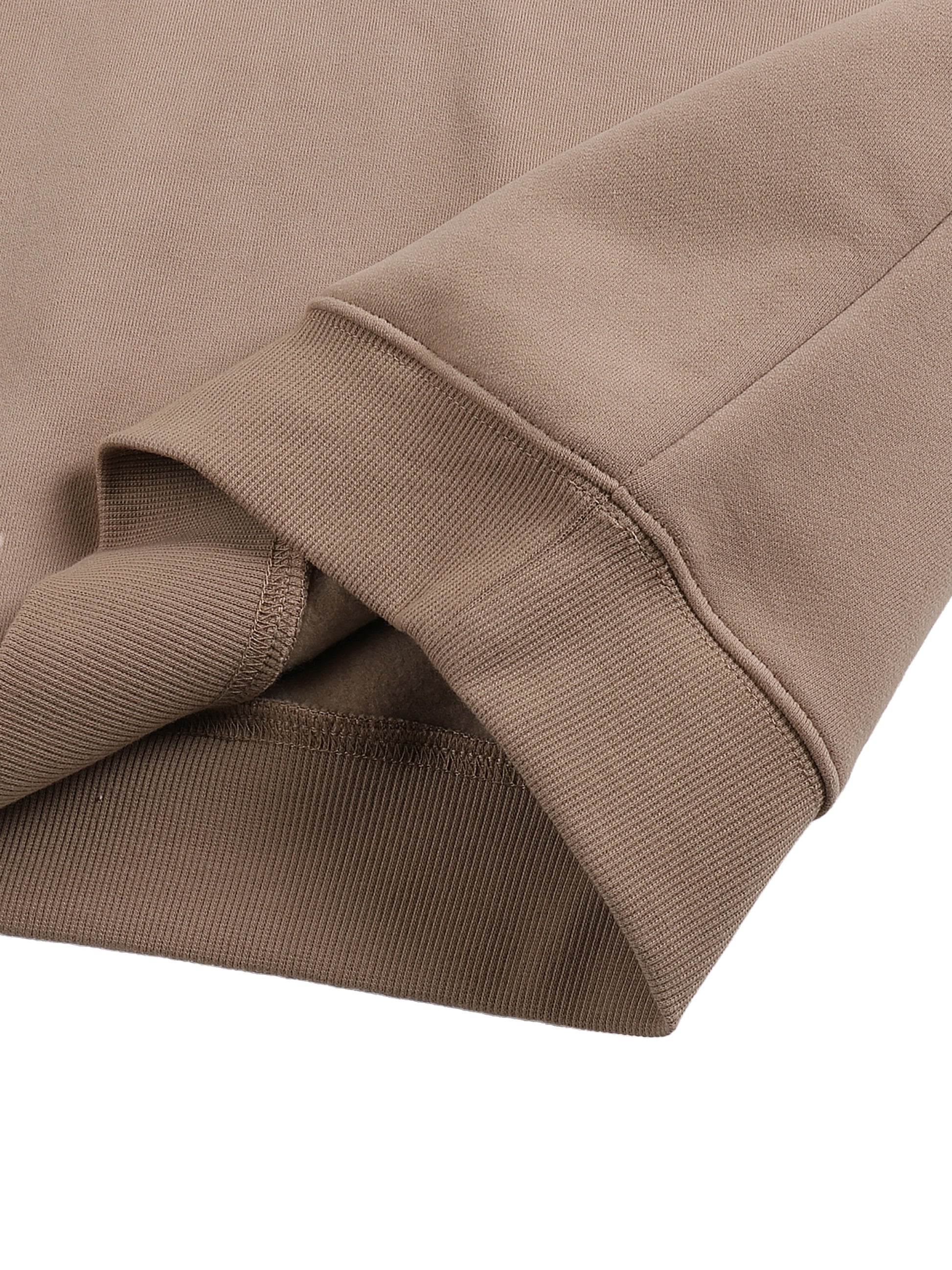 ODMPOD fleeced sweatshirt showing a cozy, soft fabric with a relaxed fit, in a neutral color, displayed on a hanger.