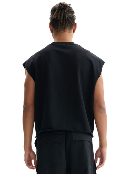ODMPOD French Terry boxy tank top displayed on a hanger, showcasing its relaxed fit and soft fabric texture.