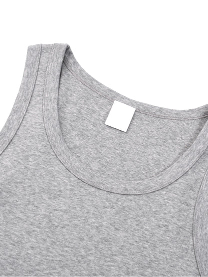 ODMPOD Essential Performance Tank Top, lightweight athletic tank top with a fitted design, shown in a vibrant color.