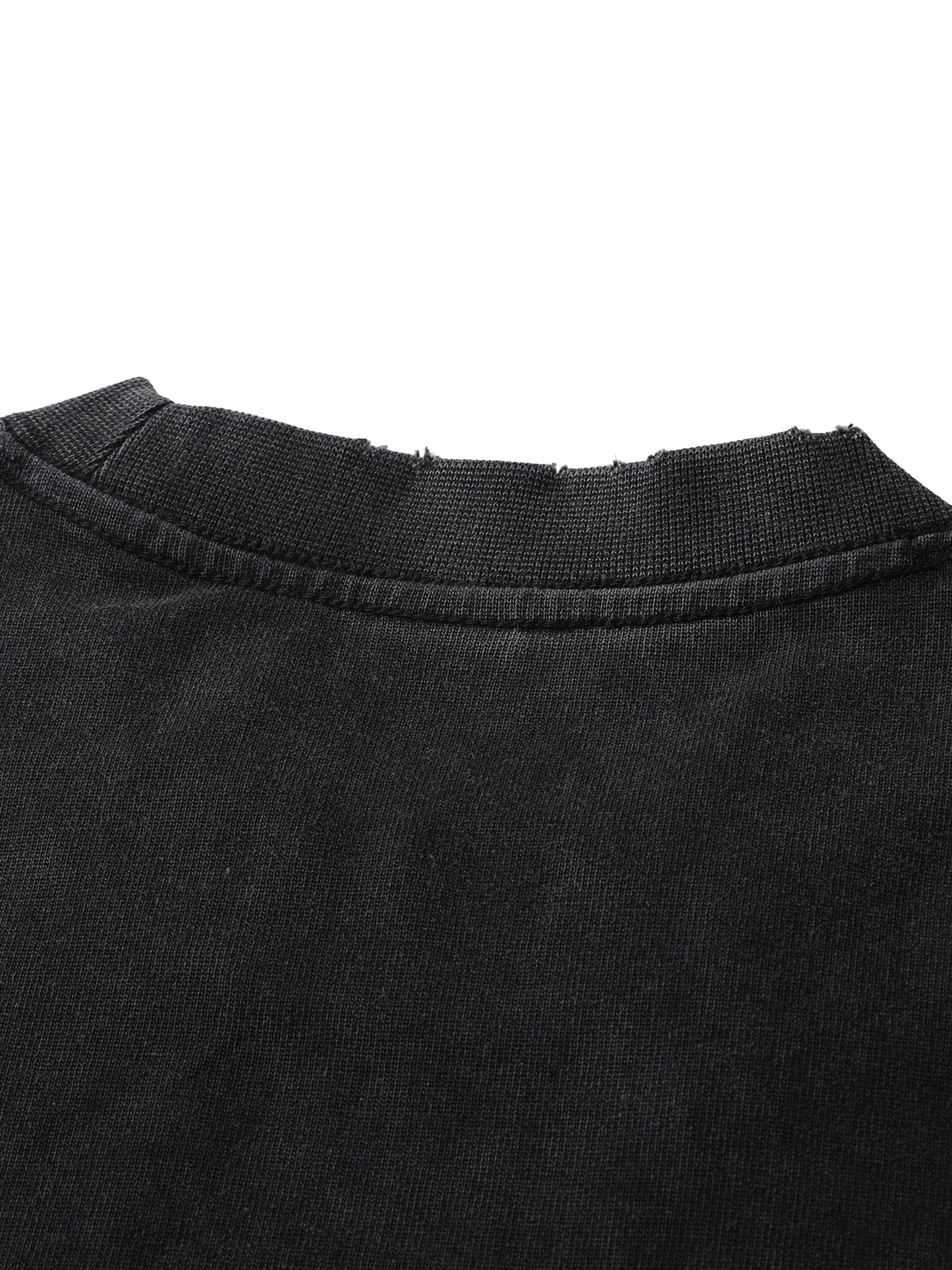 ODMPOD heavyweight vintage washed frayed t-shirt showing distressed fabric and casual fit in a close-up view