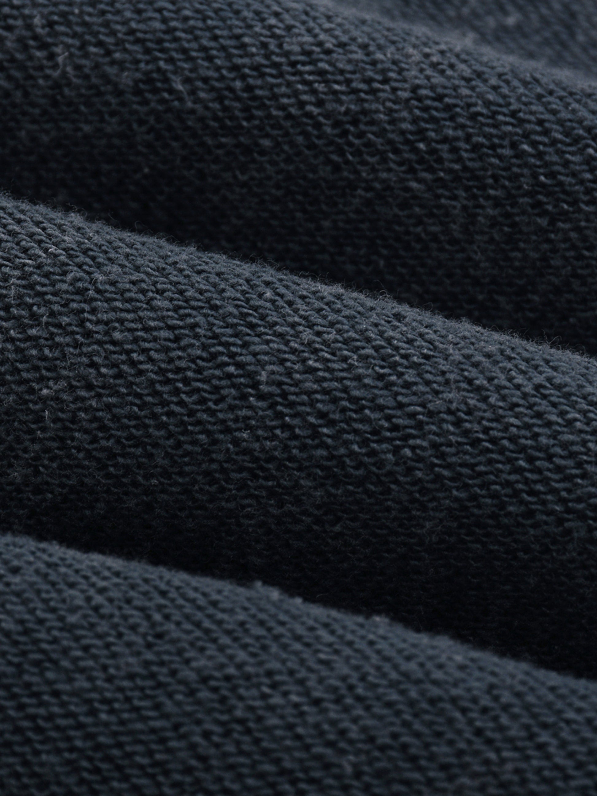 Snow Washed Raw Edge Cropped Sweatshirt by ODMPOD, featuring a relaxed fit with raw hem and snow-washed fabric detail.