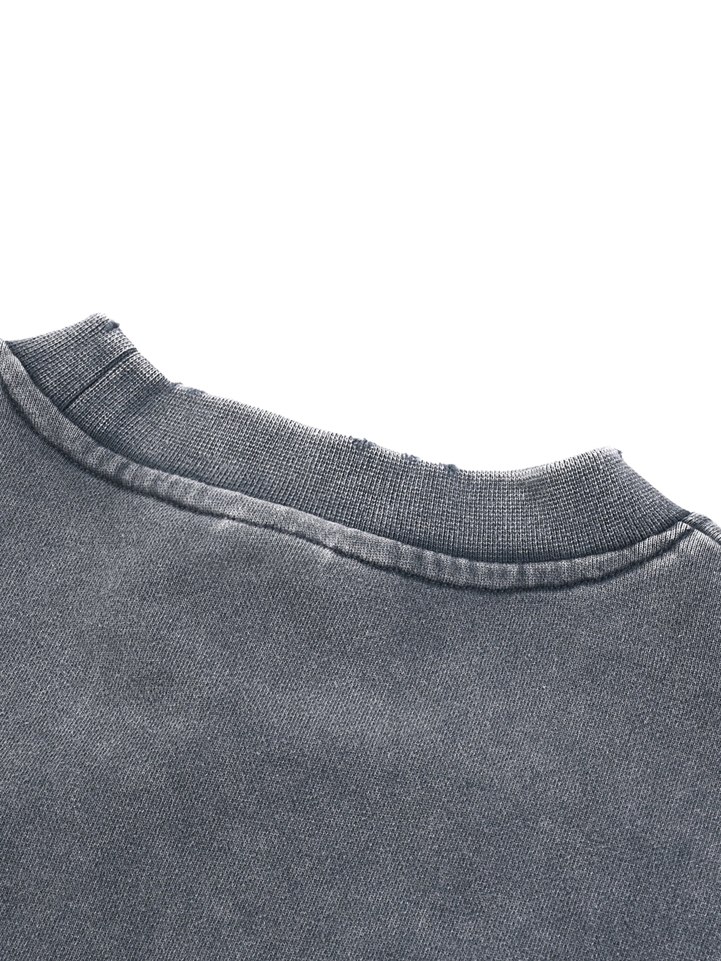 ODMPOD Snow Washed Raw Edge Cropped Sweatshirt showing distressed raw hem and relaxed fit in soft fabric, casual streetwear style.