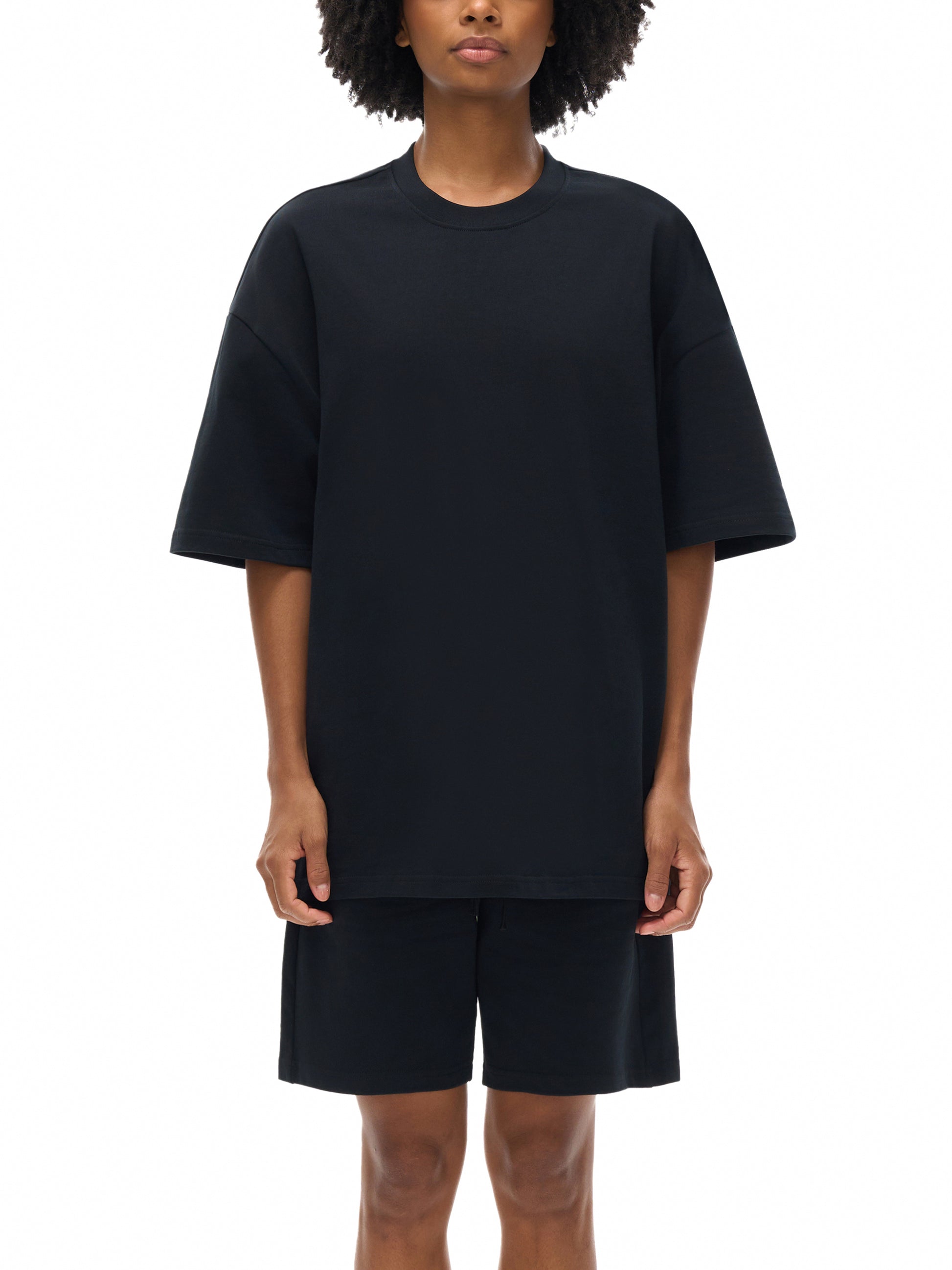 ODMPOD essential heavyweight cotton t-shirt, plain white front view showing soft fabric and classic fit.