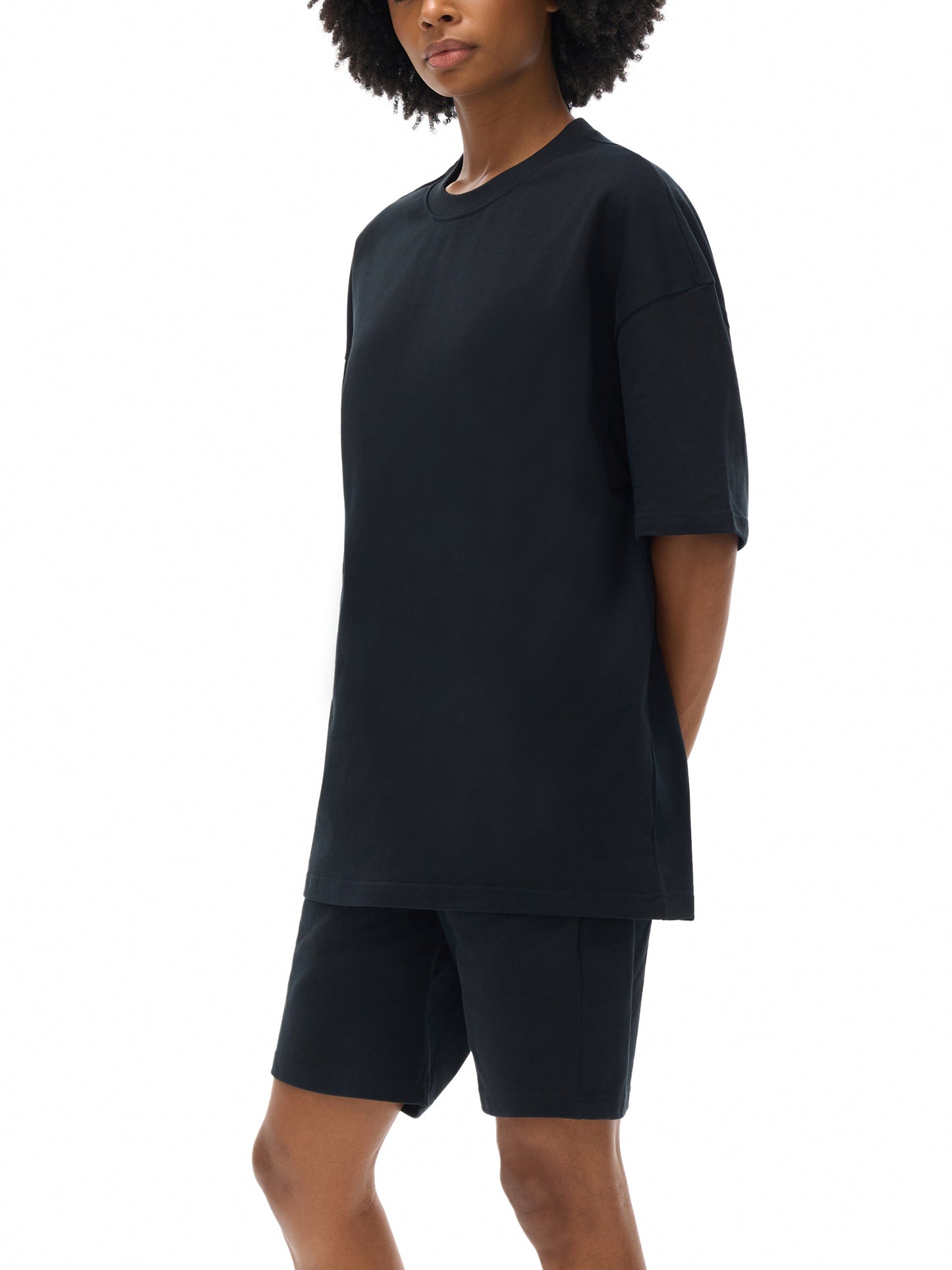 ODMPOD Essential heavyweight cotton t-shirt, front view showing classic fit and soft fabric in natural color.