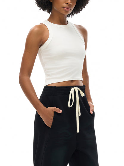 Snow Washed Tank Top by ODMPOD, light blue sleeveless shirt with a relaxed fit, displayed flat against a white background.