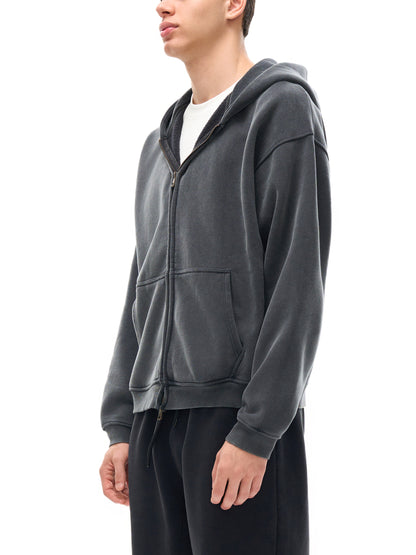 ODMPOD zip-through boxy fleece hoodie shown in soft, cozy fabric with a front zipper and relaxed fit.