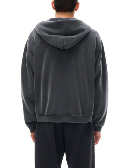 ODMPOD zip-through boxy fleece hoodie, front view showing cozy fleece fabric, zip-up design, and relaxed fit.
