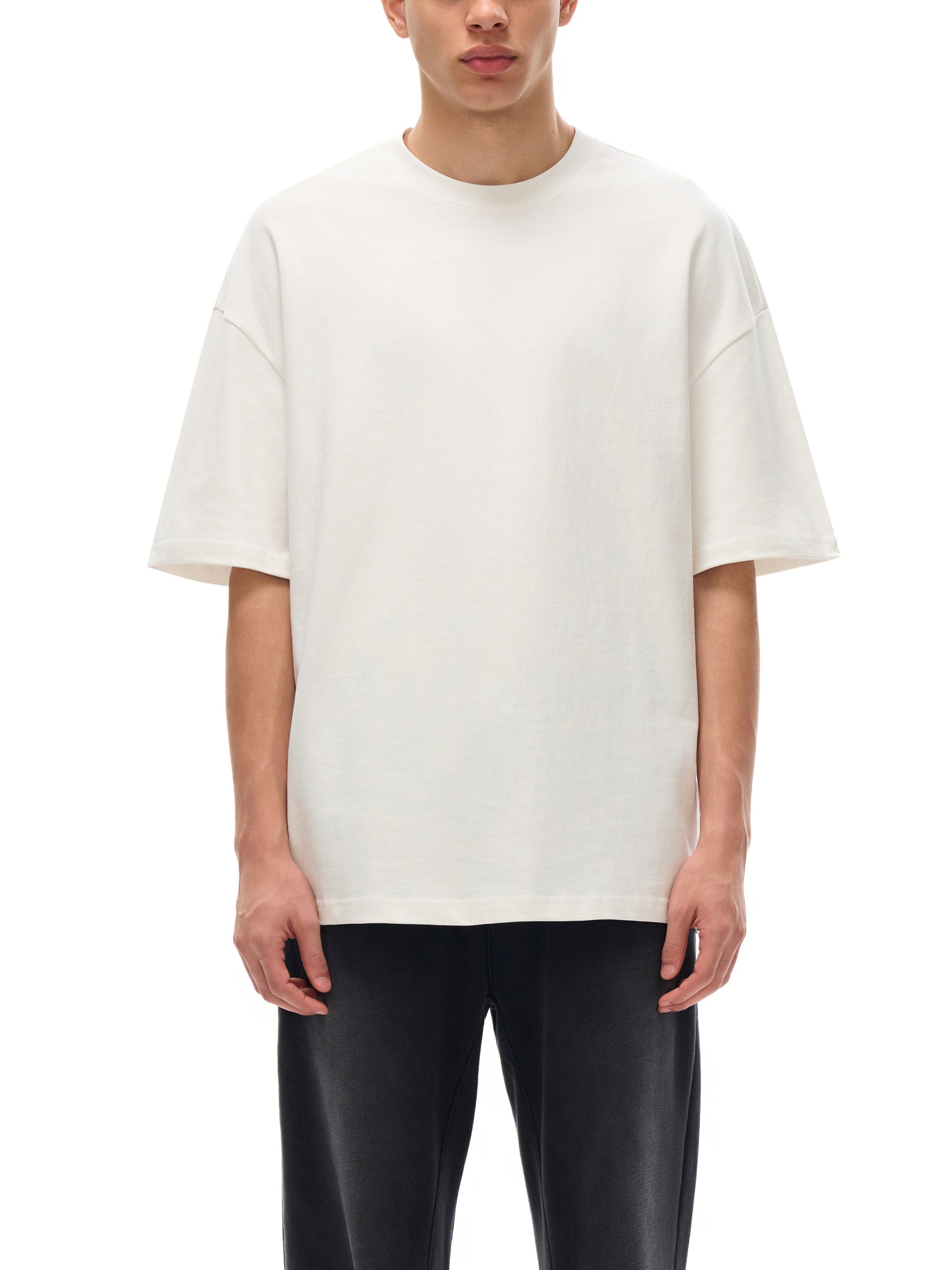 ODMPOD essential heavyweight cotton t-shirt in classic fit, shown in a neutral color with short sleeves and a round neckline.