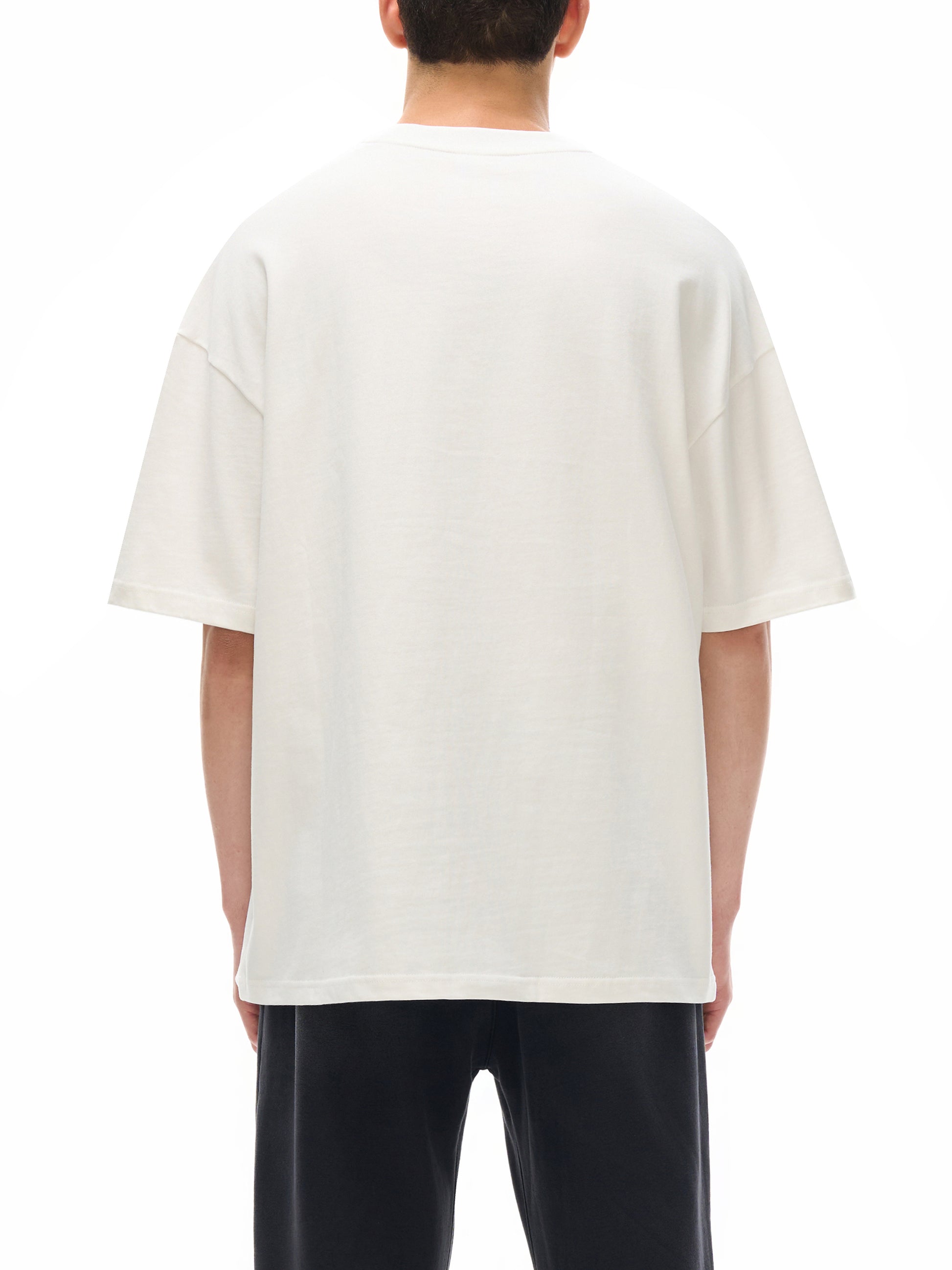 Essential heavyweight cotton t-shirt by ODMPOD, shown in natural fabric texture with a classic t-shirt fit and neutral color.