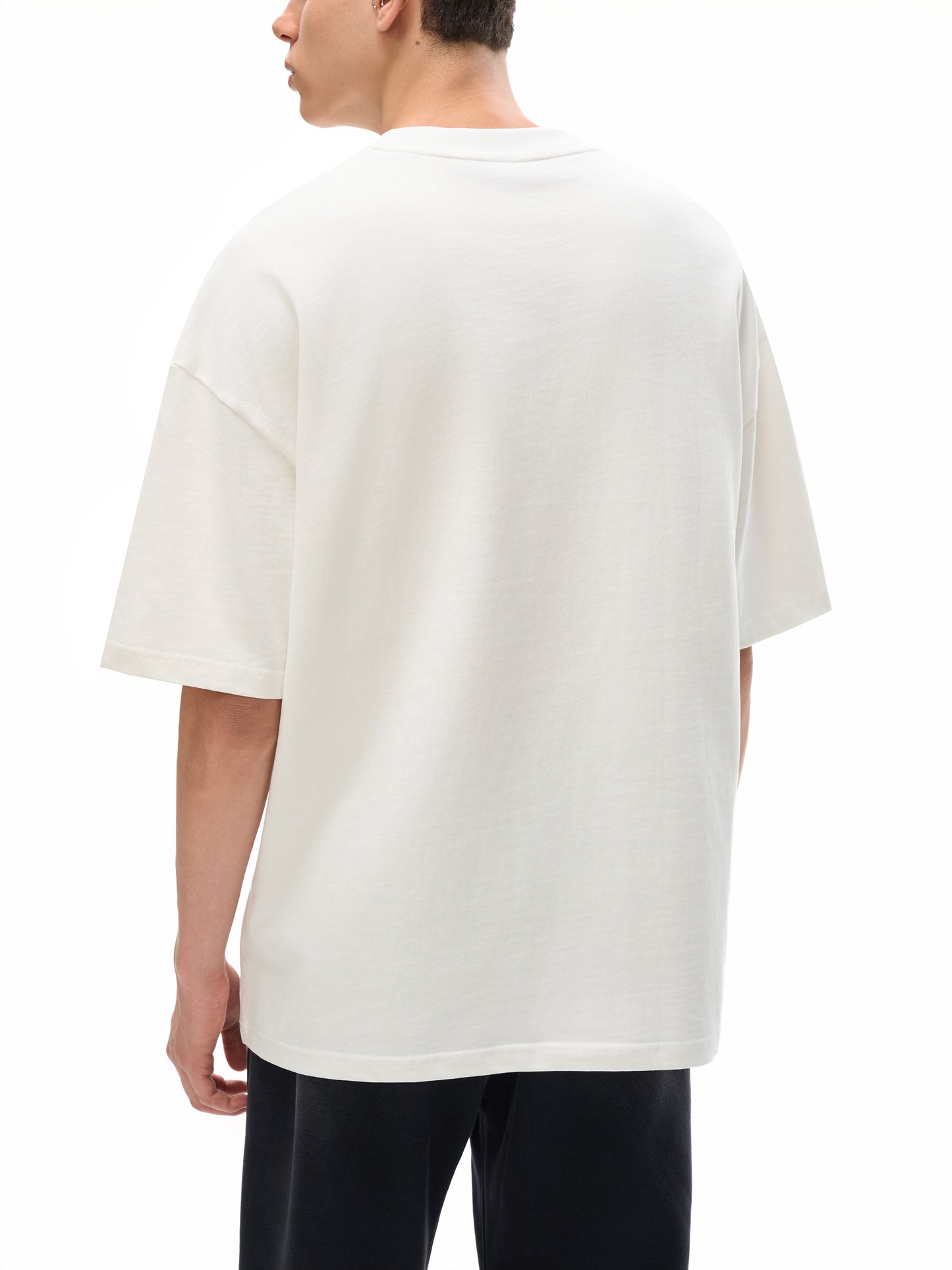 ODMPOD Essential Heavyweight Cotton T-Shirt in black, showcasing a classic fit with short sleeves and a round neckline.