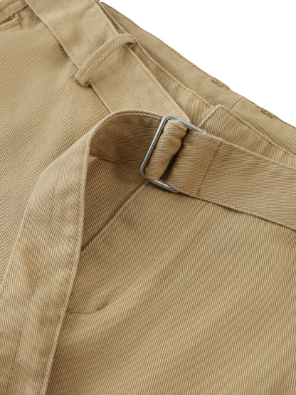 ODMPOD belted barrel-leg chino pants displayed on a model, showcasing a relaxed fit and classic style.