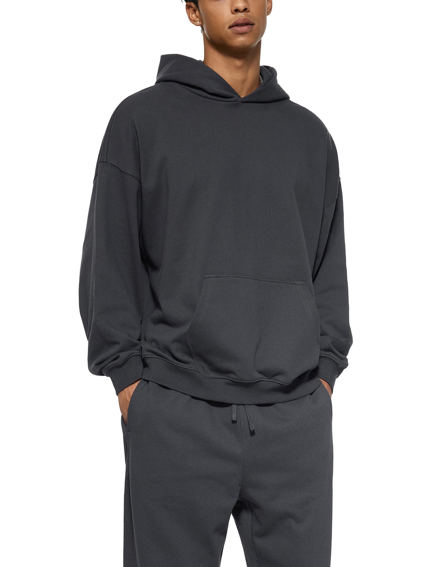 ODMPOD Essential Heavyweight Hoodie in gray, showing front view with a soft, thick fabric and adjustable drawstrings.