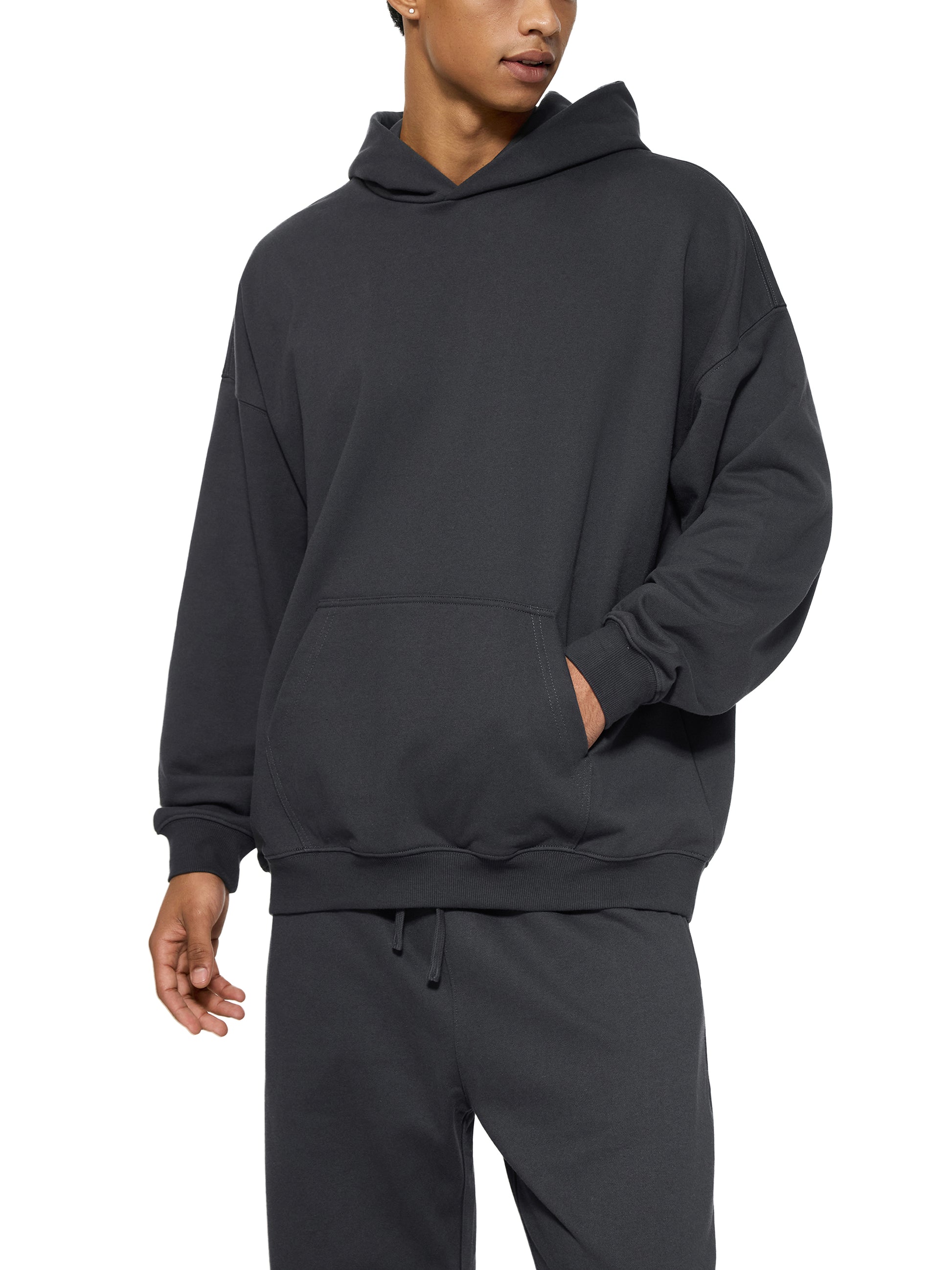 ODMPOD Essential Heavyweight Hoodie in charcoal gray, showing front view with hood, drawstrings, and soft fabric texture.
