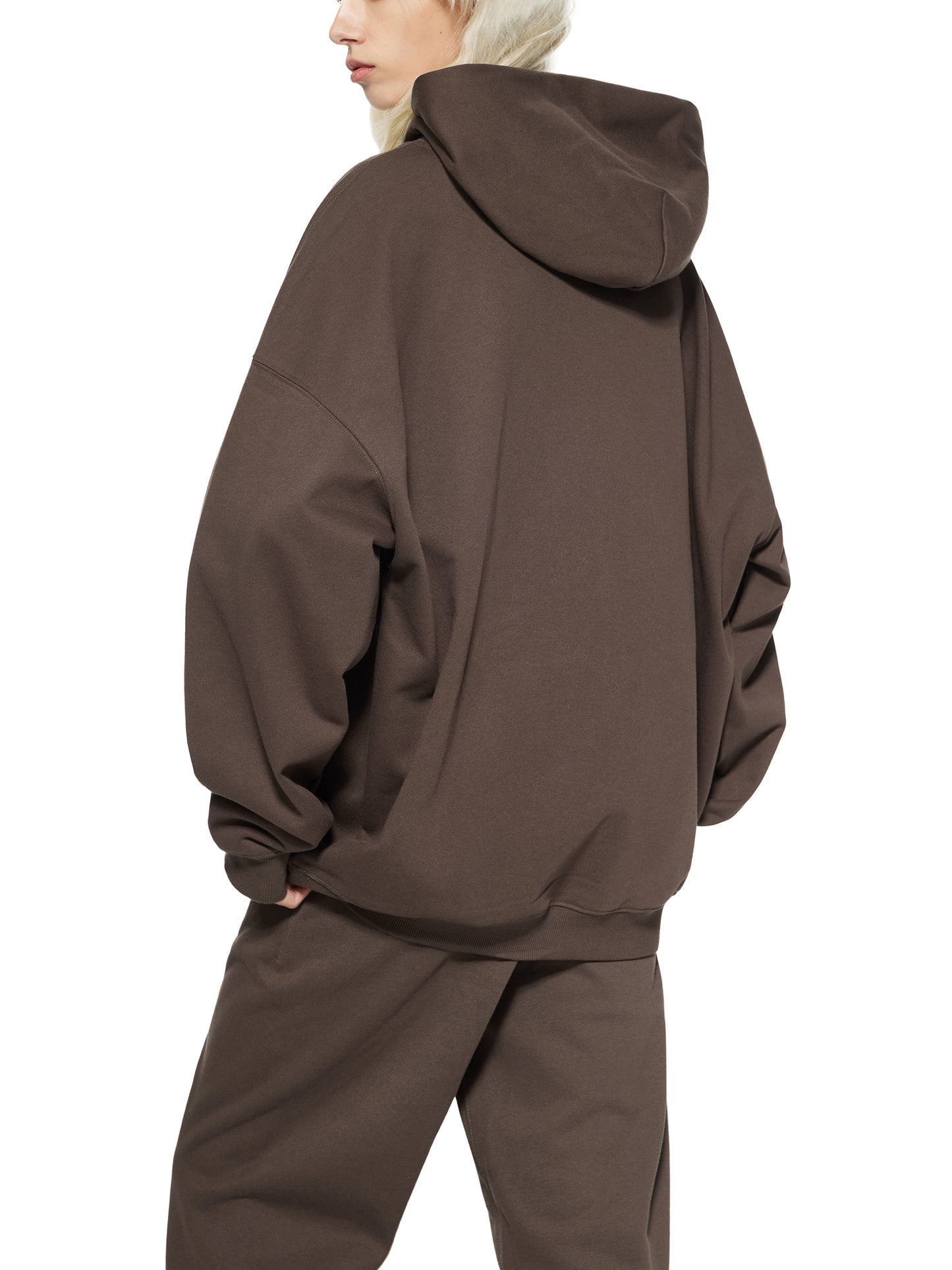 ODMPOD Essential Heavyweight Hoodie shown in gray with a front pocket and drawstring hood, made of soft, durable fabric.