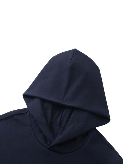 ODMPOD Essential Heavyweight Hoodie in gray, showing front view with hood, cuffs, and soft fabric texture.
